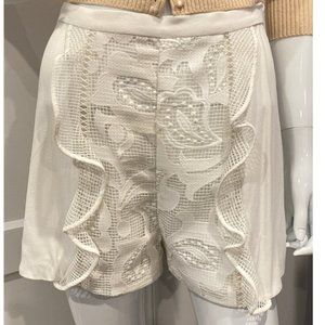 ALEXIS white lace and ruffle front shorts